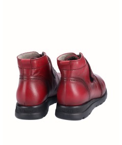 Flat red leather ankle boots with elastic and velcro closure