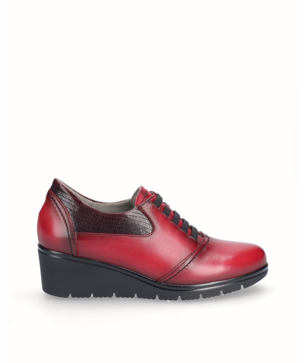 Burgundy red leather sports shoe