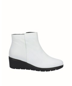 Polar white leather wedge ankle boots