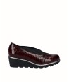 Burgundy engraved leather...