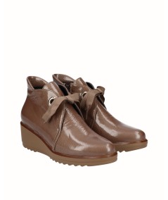 Brown patent leather wedge ankle boot