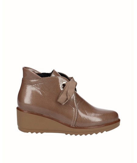 Brown patent leather wedge...
