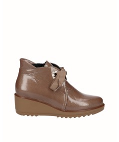 Brown patent leather wedge ankle boot