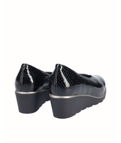 Black engraved leather wedge shoe