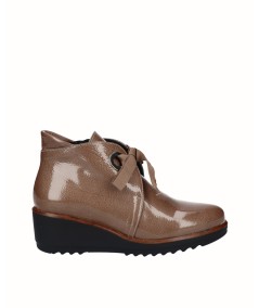 Brown patent leather wedge ankle boot